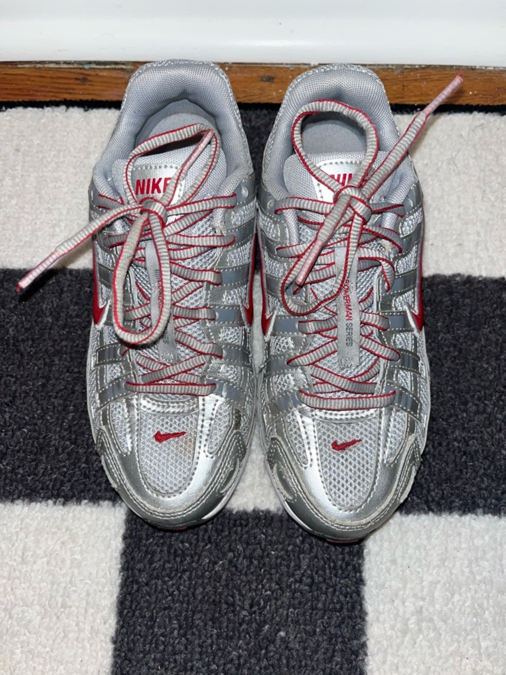 Nike Kids Silver Sneakers with Red Accents